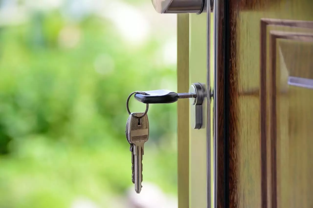 Real Estate key on door